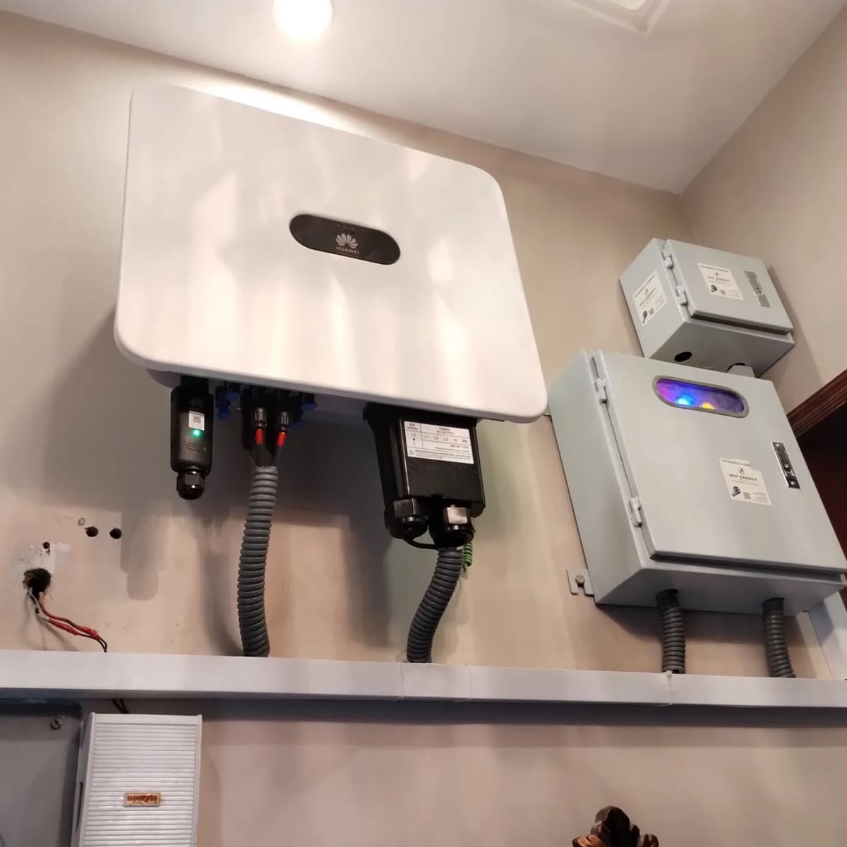 Huawei 25 kW on-grid inverter with AC and DC protection boxes in Gulistan-e-Johar